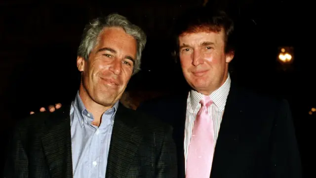 Jeffrey Epstein and Donald Trump photographed together at a social gathering, both smiling at the camera in formal attire, representing their documented association before Epstein's criminal charges